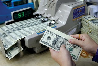 Ngân hàng Nhà nước nới biên độ tỷ giá lên 3%, tăng tỷ giá thêm 1%